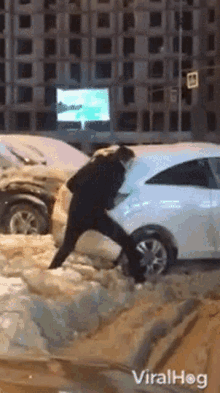pushing car viralhog stuck snow push