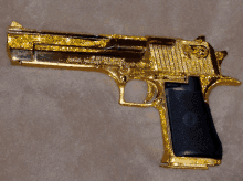 Gun Gold GIF - Gun Gold Sparks GIFs
