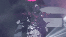 a person in a costume is holding a red sword in their hand .