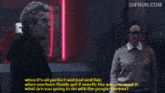 a gif from gifrun.com shows a man pointing at someone