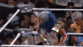 a woman in a wrestling ring holding a championship belt that says draft