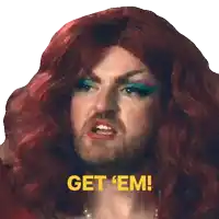 a drag queen with red hair and a beard says " get em "