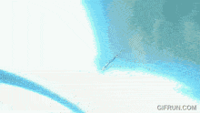 a gif from gifrun.com shows a blue light coming out of a sword