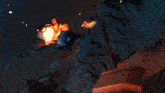 a close up of a fire with a lot of flames and smoke