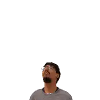 a man holds a green plus sign on his head