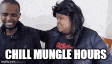 two men are sitting next to each other and one of them is wearing a wig and the other is wearing a jacket .