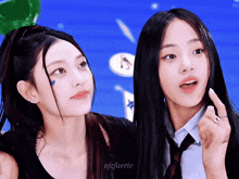 two girls are standing next to each other with the name njfaerie on the bottom right corner