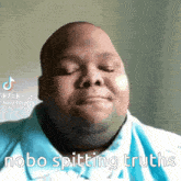 a man with his eyes closed and the words nobo spitting truths written below him .