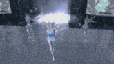 a blurred image of a woman in a blue dress