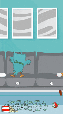 a cartoon of a bird standing on a couch with a bucket of popcorn on the floor