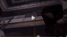 a video is being played with a play button in the middle