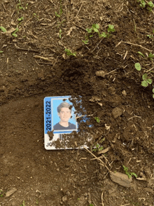 a dirty id card with the year 2021-2022 on it