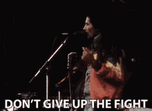 Dont Give Up The Fight Singing GIF - Dont Give Up The Fight Singing Performing GIFs
