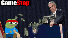 a man is giving a speech in front of a podium with a game stop logo behind him