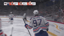 a hockey player wearing a jersey with the number 97 on it