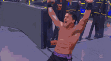 a man in a wrestling ring is wearing a shirt that says coca cola