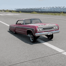 a pink car with a license plate that says ' s118 ' on it