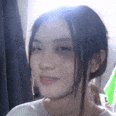 a close up of a girl making a funny face