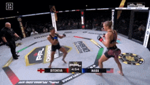 ditcheva and inaba are fighting in a ring that says ' road to dubai ' on it