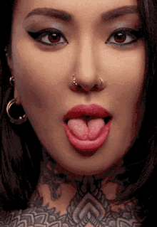 Woman Split Tongue GIF
