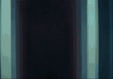 a dark background with a few lines of light on it