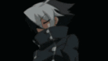 a blurry image of a person 's face with a black background and a white circle in the middle