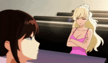 a girl with blonde hair is standing next to another girl