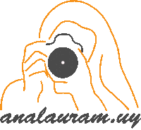 a drawing of a person taking a picture with the word amalauram.wy below it
