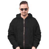 a man wearing sunglasses and a black hoodie