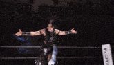 a wrestling ring with a sign that says slive