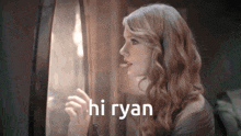 a woman is looking out a window and the words hi ryan are visible