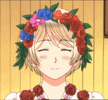 a girl with a flower crown on her head smiles with her eyes closed