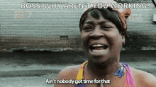 a woman is laughing and saying boss why aren 't you working