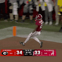 a football game between georgia and alabama is going on