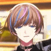 a close up of a person 's face with short hair and blue and pink highlights .