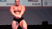 alexey lesukov bodybuilder posing massive