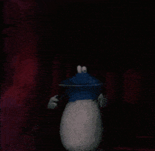 a blue and white cartoon character with a big mouth