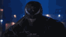 a close up of venom 's face with a caption that says oh shit