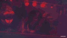 a man in a wrestling ring with the words impact wrestling on the bottom