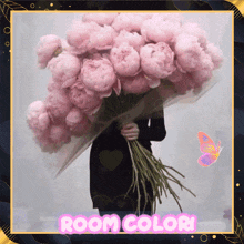a woman holding a large bouquet of pink flowers with room color written on the bottom right