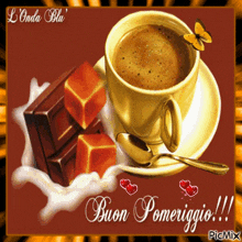 a cup of coffee on a saucer with the words buon pomeriggio written on the bottom