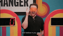 a man wearing a blindfold says and i believe in you