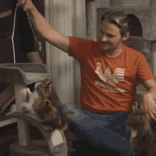 Playing With The Cat Tim Foust GIF - Playing With The Cat Tim Foust Home Free GIFs