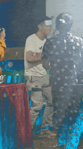 a man in a white shirt with an eagle on it