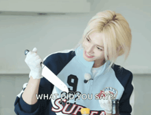 a woman holding a knife with the words what did you say on the bottom right