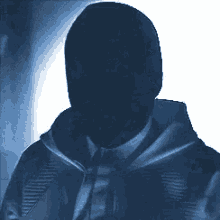 a silhouette of a man in a suit and tie with no face