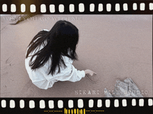 a picture of a girl on a beach with the words " without you go with me " on the bottom