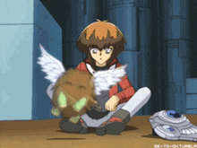a cartoon of a boy sitting on the ground holding a winged animal