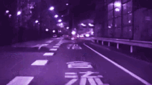 a blurry picture of a street with a purple background and the number 19 on the road
