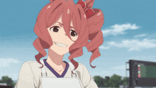 a girl with red hair is smiling and wearing a white apron